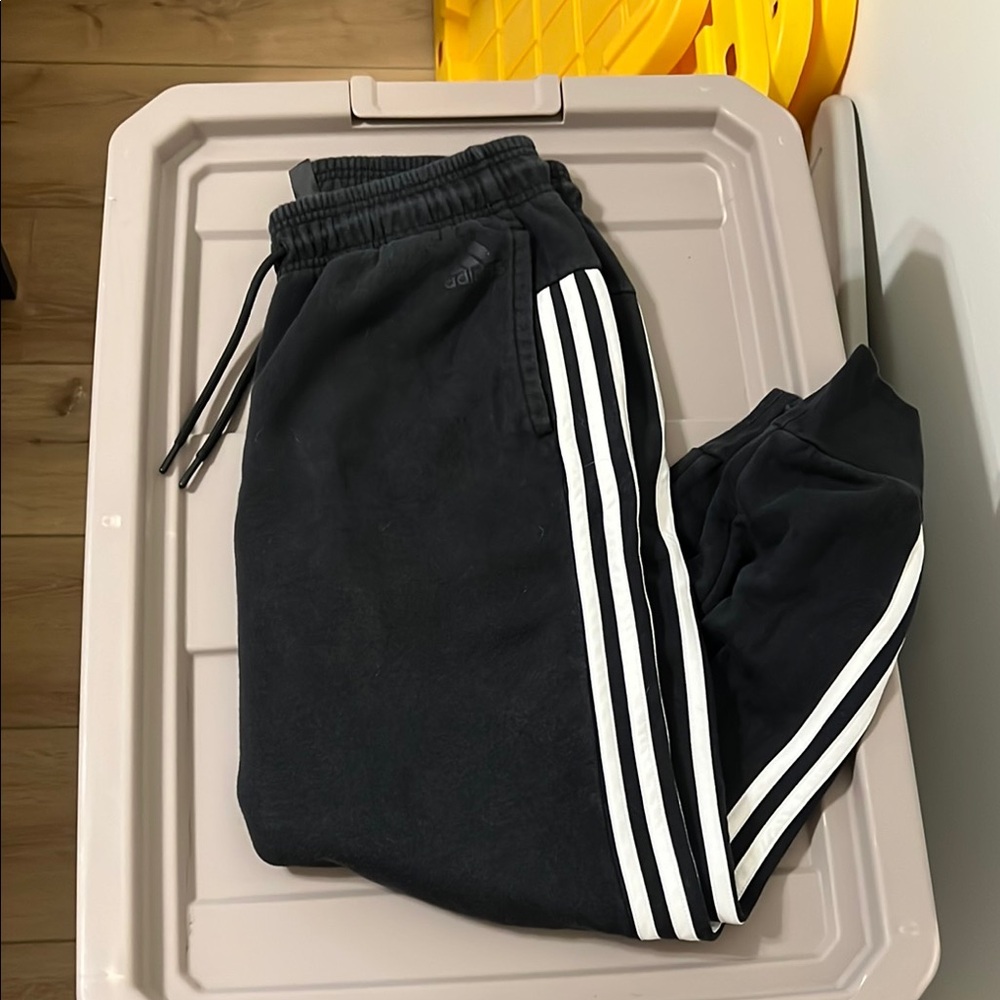 Adidas Black and White Sweatpants with Iconic Stripes